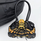 Reconstructed shoes into handbags