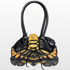 Reconstructed shoes into handbags